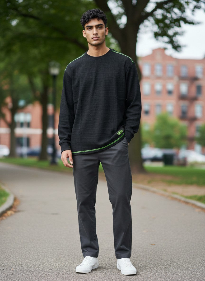 Throwback Rack black waffle-knit thermal long sleeve shirt with neon green stitching and Kangol logo.