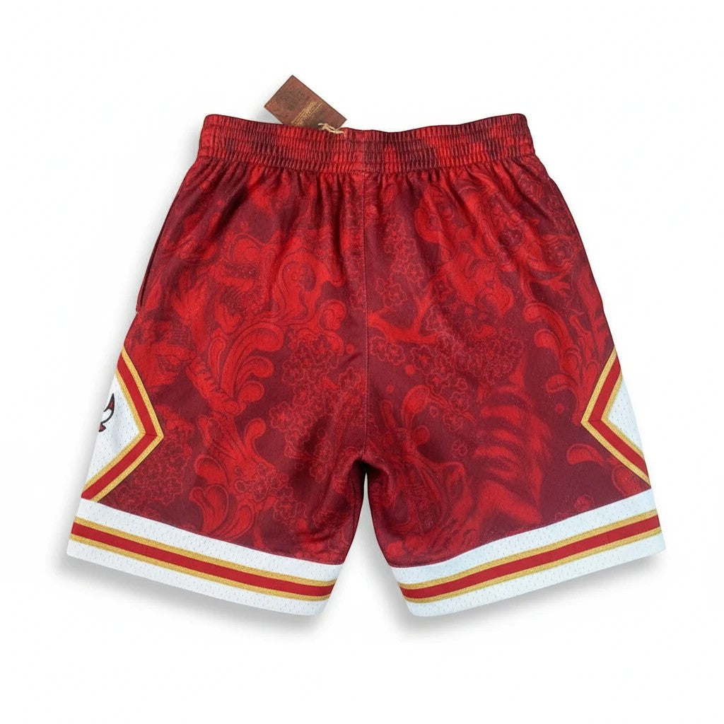 Throwback Rack red Chicago Bulls basketball shorts in mesh with a tonal paisley pattern and striped hem detailing.