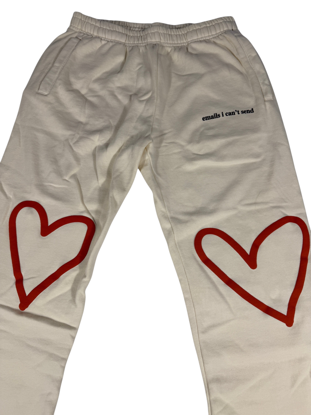 Throwback Rack Sabrina Carpenter cream sweatpants featuring red heart graphics and emails i can't send text