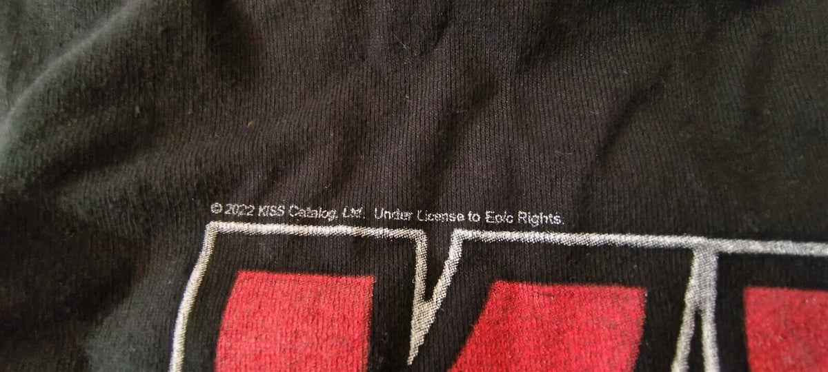 Throwback Rack black cotton KISS 2022 graphic t-shirt with official licensing text printed above the band logo