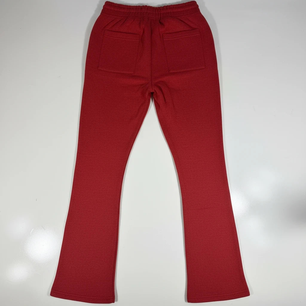 Throwback Rack red wide-leg cotton sweatpants with back pockets, featuring a relaxed streetwear fit.