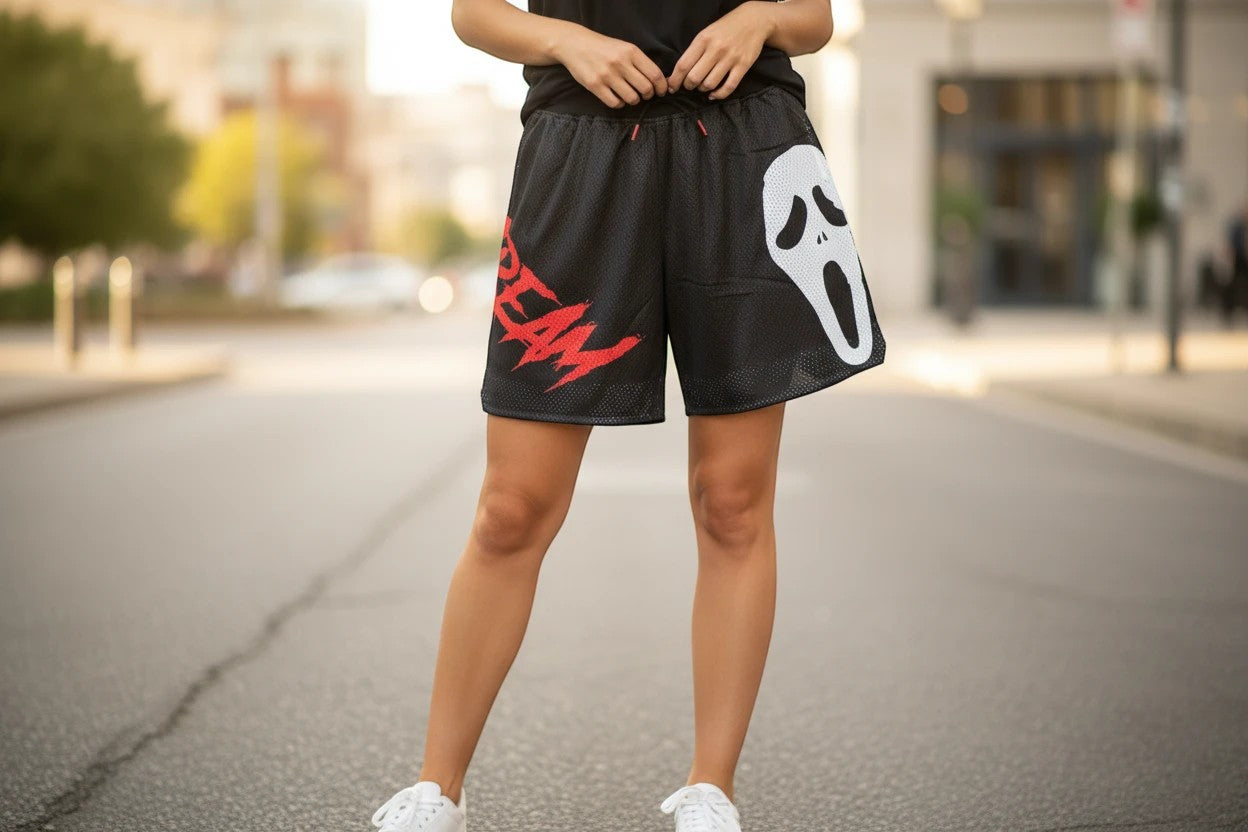Throwback Rack black mesh basketball shorts with red "SCREAM" graphic and white ghost face graphic. Elastic waist, drawstring, 3XL.