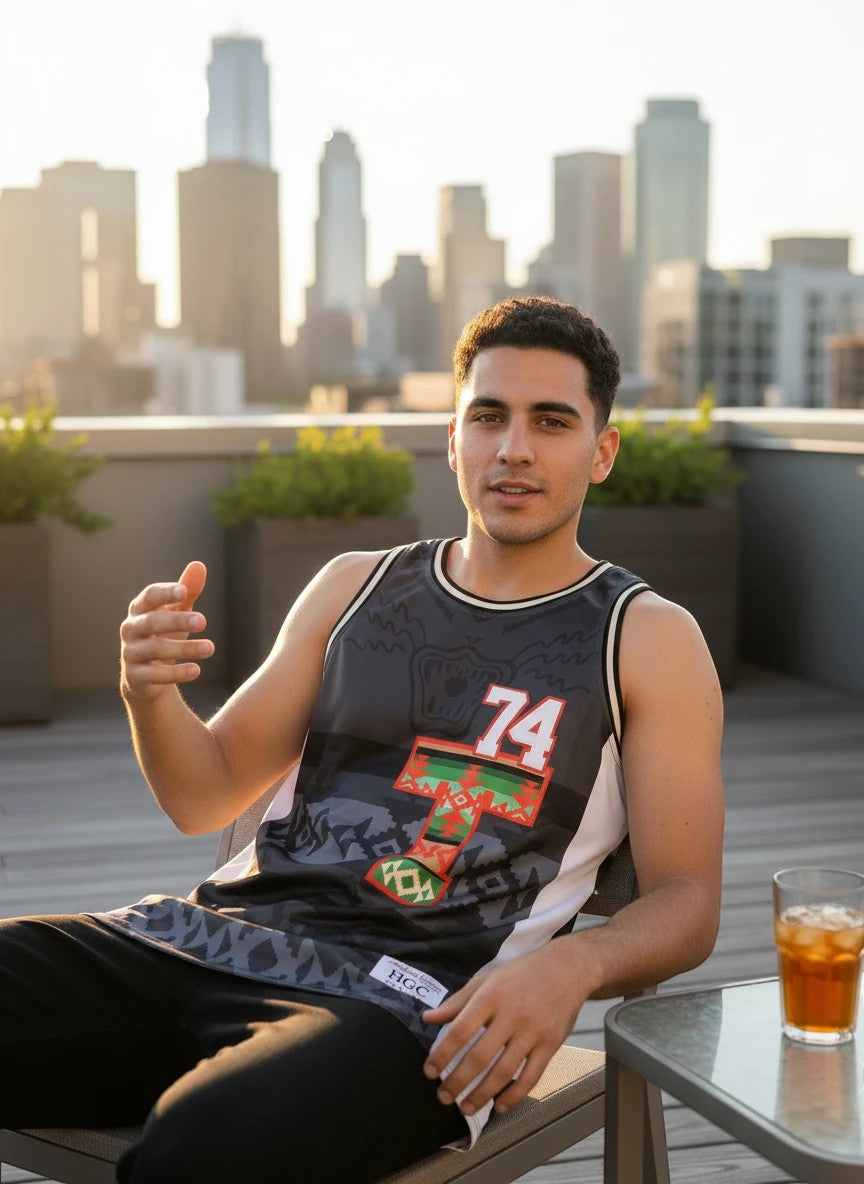 Throwback Rack Men's Tribal Tisa Basketball Jersey with geometric print, black, white, red, green, orange, and number 74.