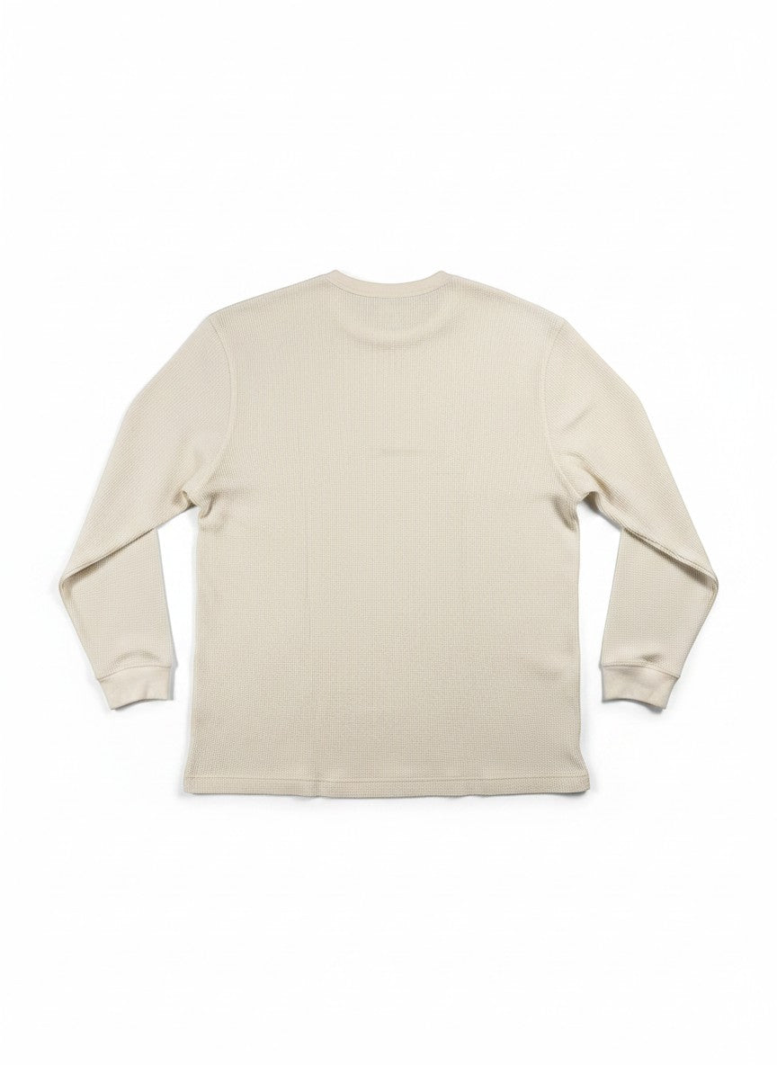 Throwback Rack beige waffle knit long sleeve thermal shirt, perfect for layering.