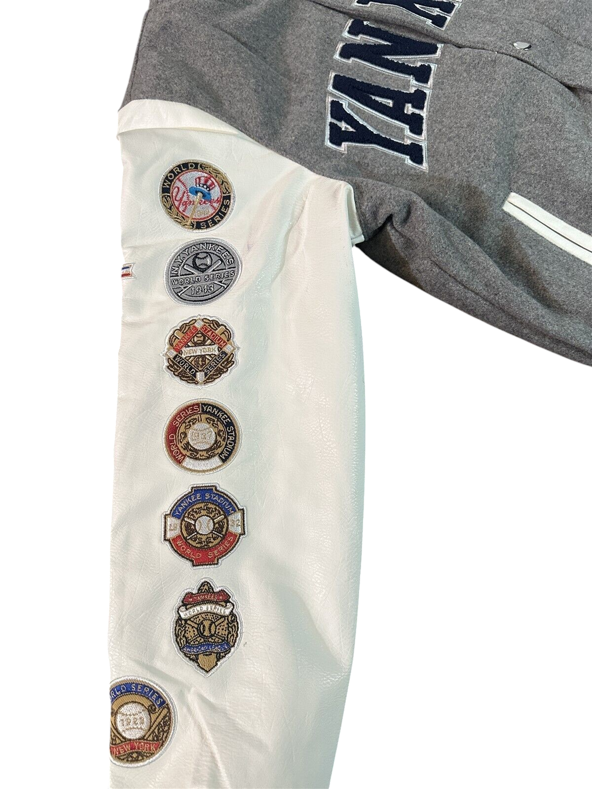 Throwback Rack New York Yankees varsity jacket sleeve featuring embroidered World Series championship patches
