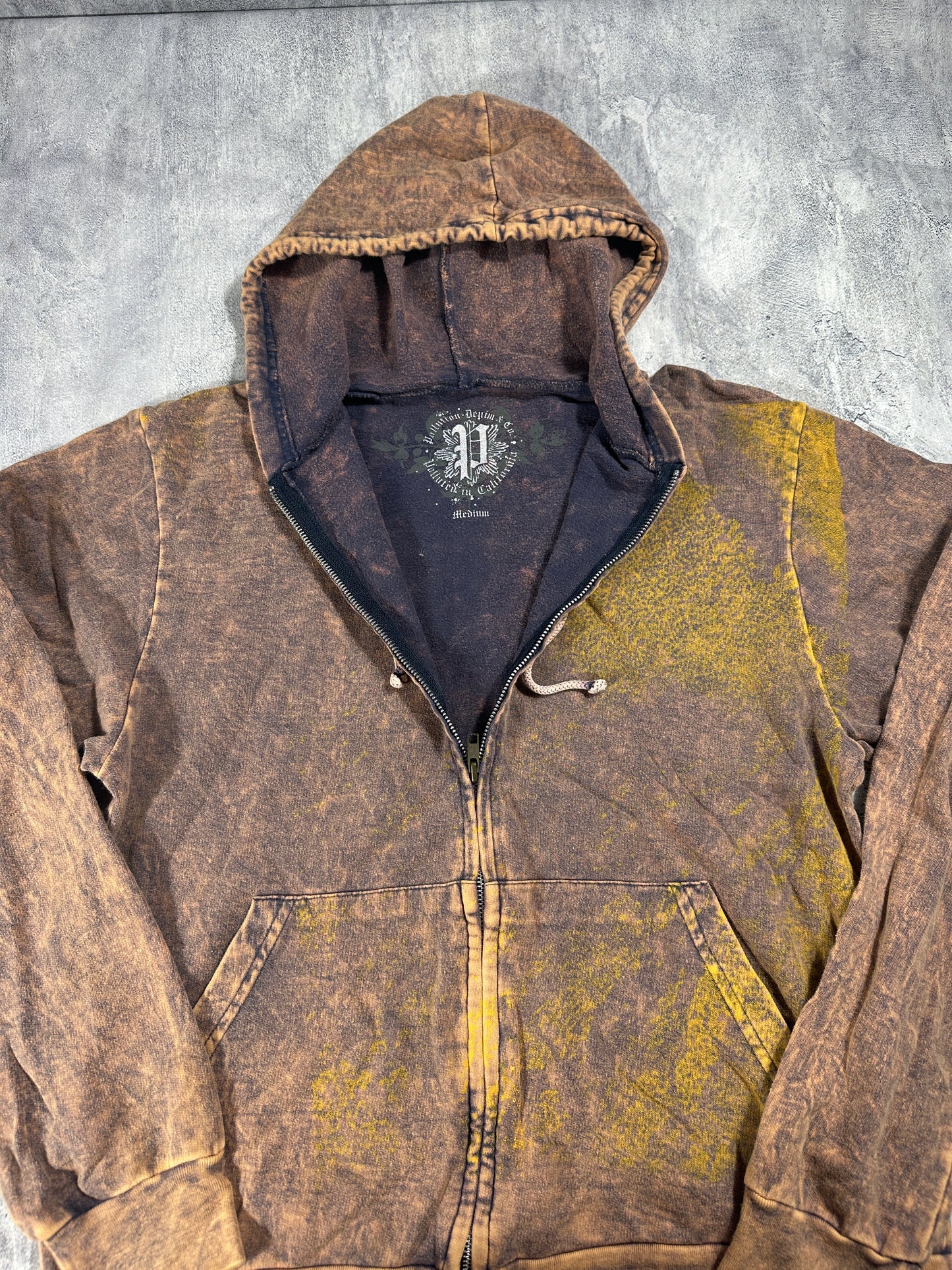 Pollution Hoodie with Skull Graphic