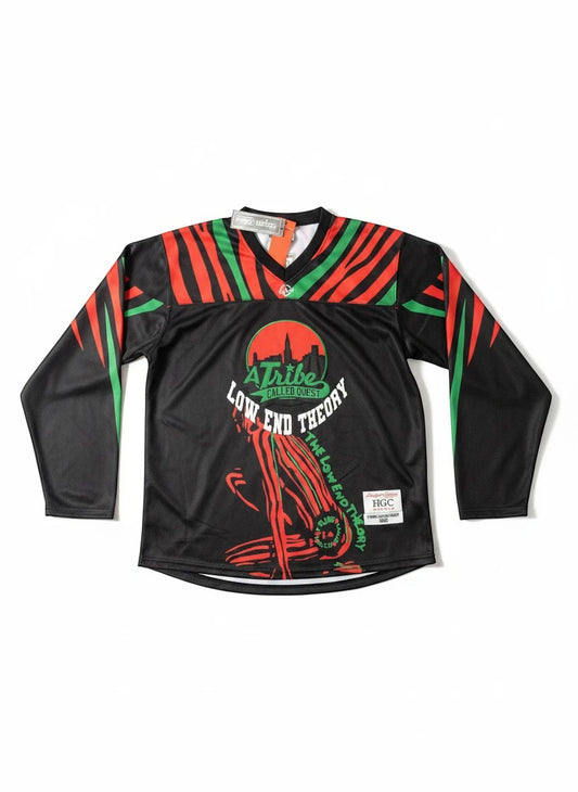 Throwback Rack A Tribe Called Quest Low End Theory black hockey jersey with red and green stripes on sleeves and chest.