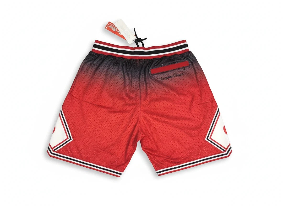 Throwback Rack Afro Samurai Headgear Classics basketball shorts in red and black mesh with zippered back pockets.