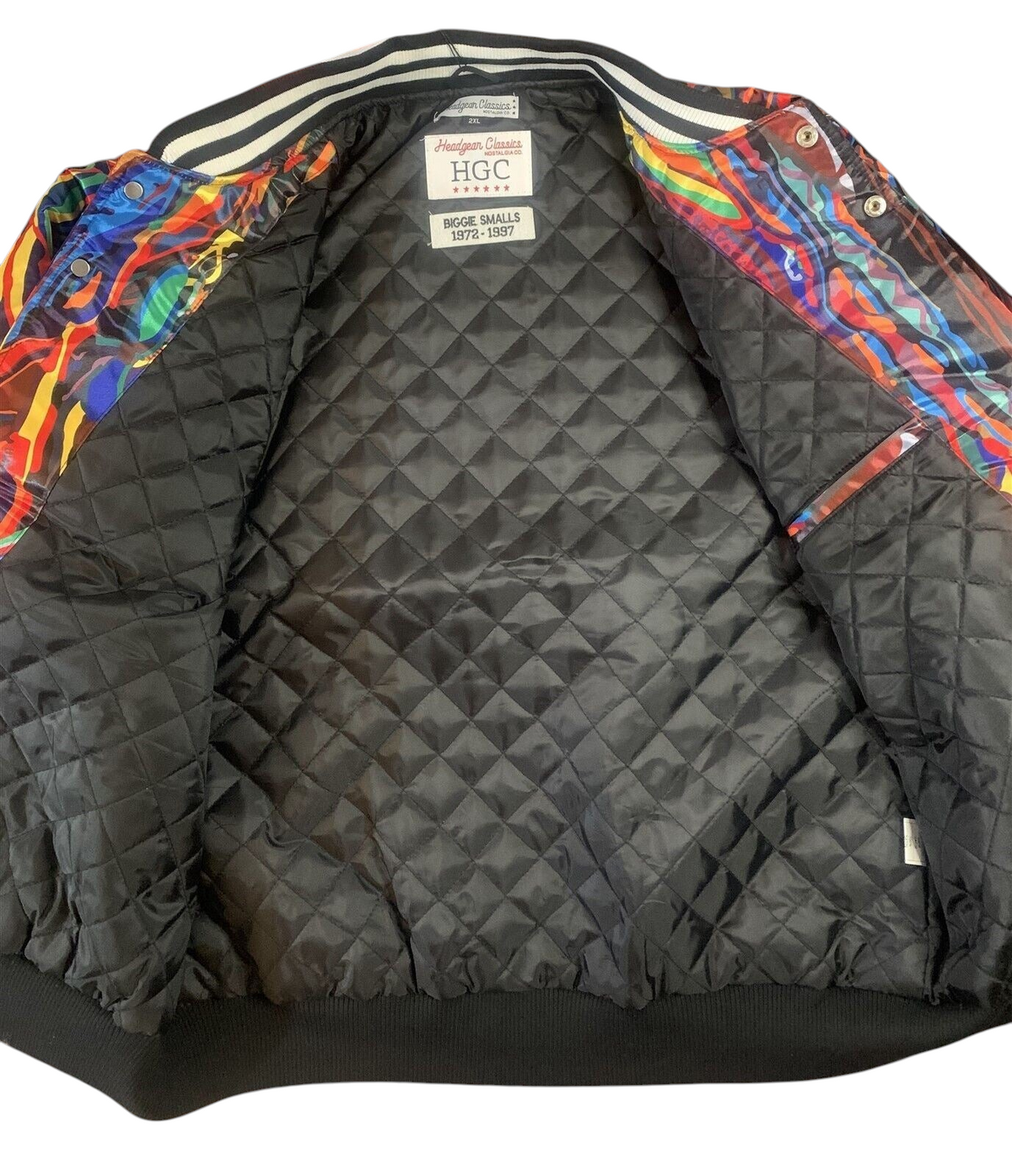 Throwback Rack Biggie Smalls varsity jacket interior with black quilted lining and commemorative tribute patch