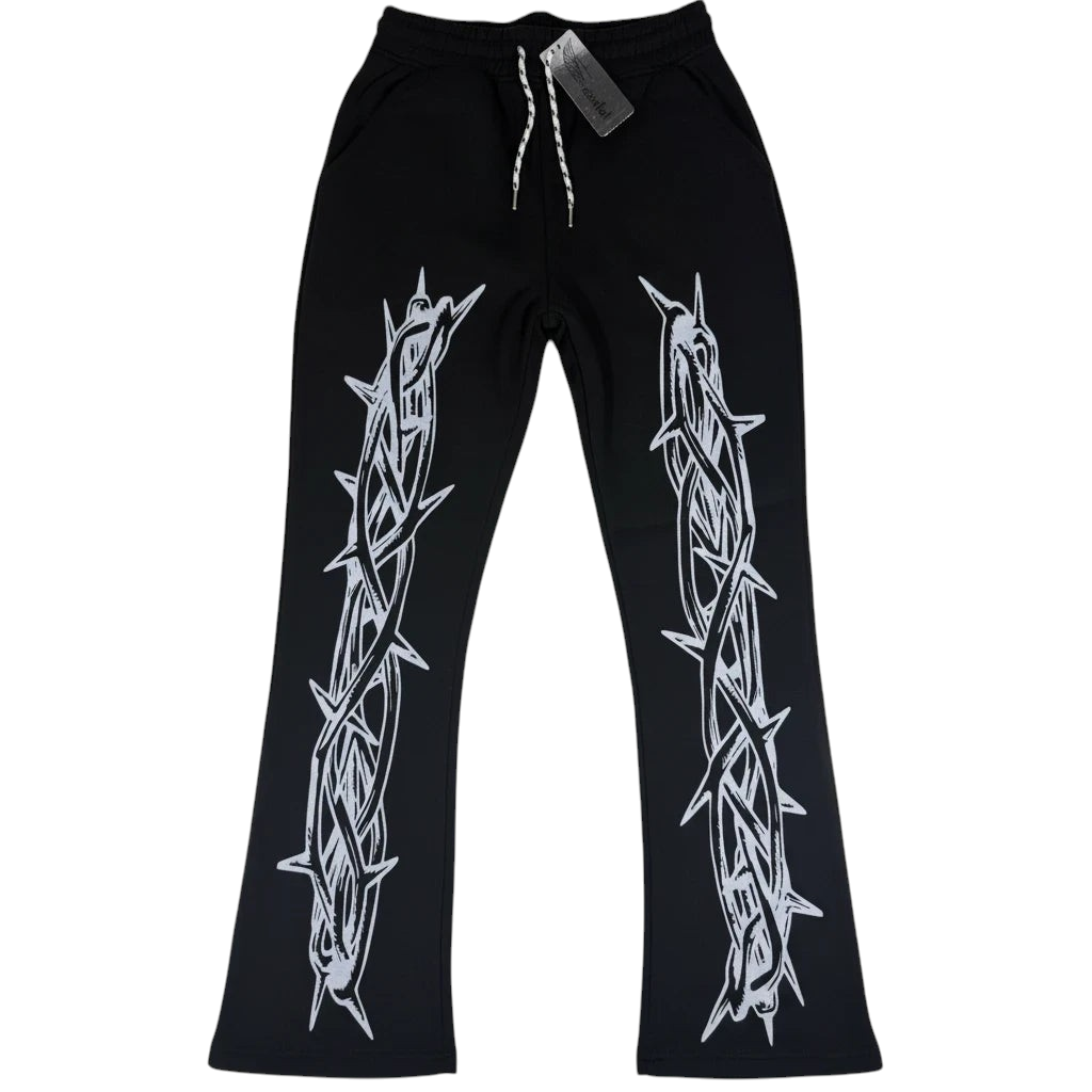 Throwback Rack black cotton sweatpants featuring a white barbed wire graphic print and a relaxed wide-leg fit.