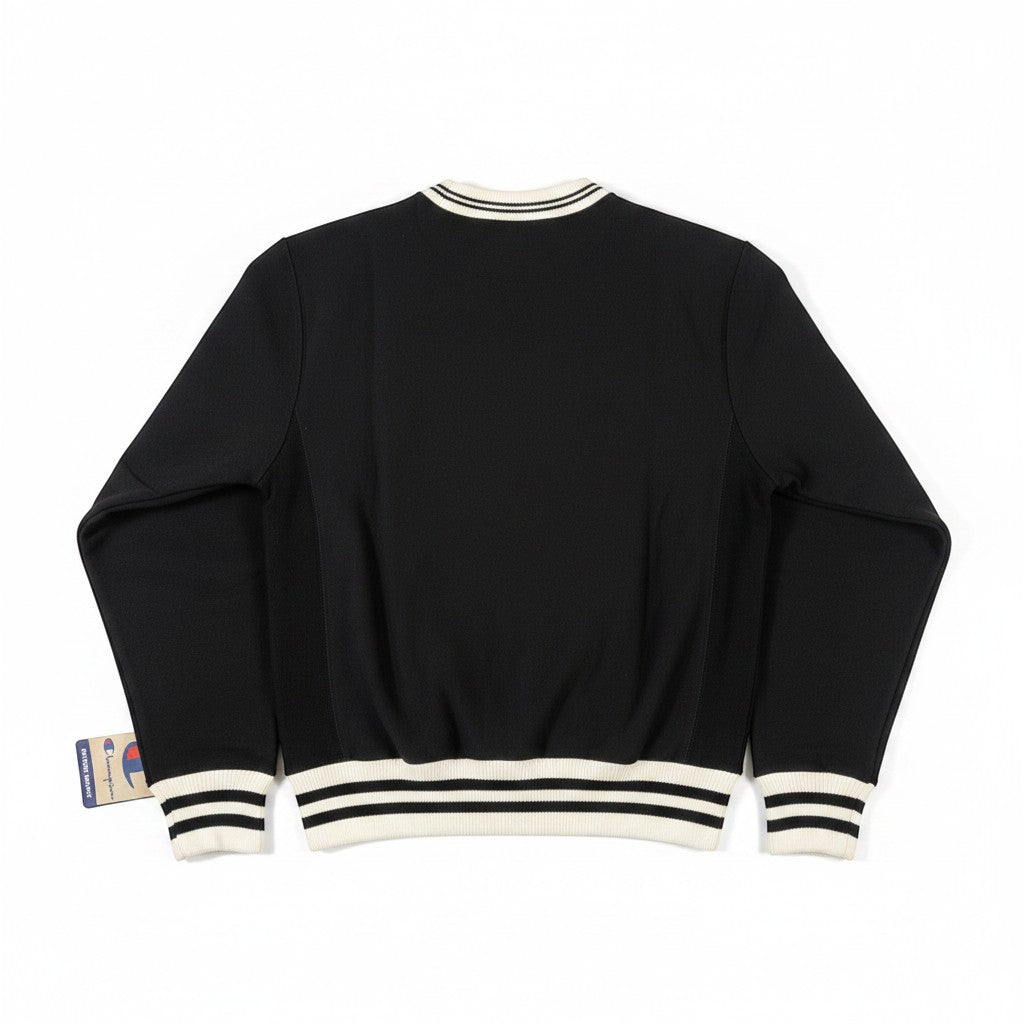 Throwback Rack Champion black heavyweight fleece crew neck sweatshirt with cream ribbed cuffs, collar, and waistband.
