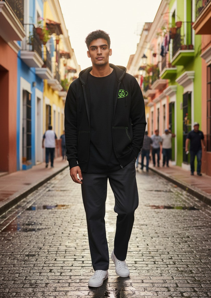 Throwback Rack black zip-up hoodie with neon green contrast stitching and oval Kangol logo.