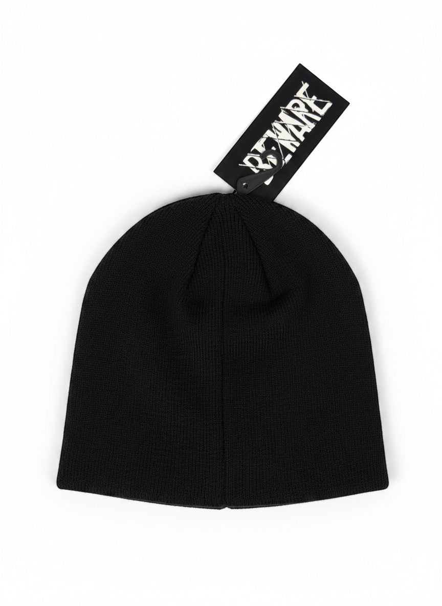 Throwback Rack black knit beanie with green skull graphic on tag. One size fits most.