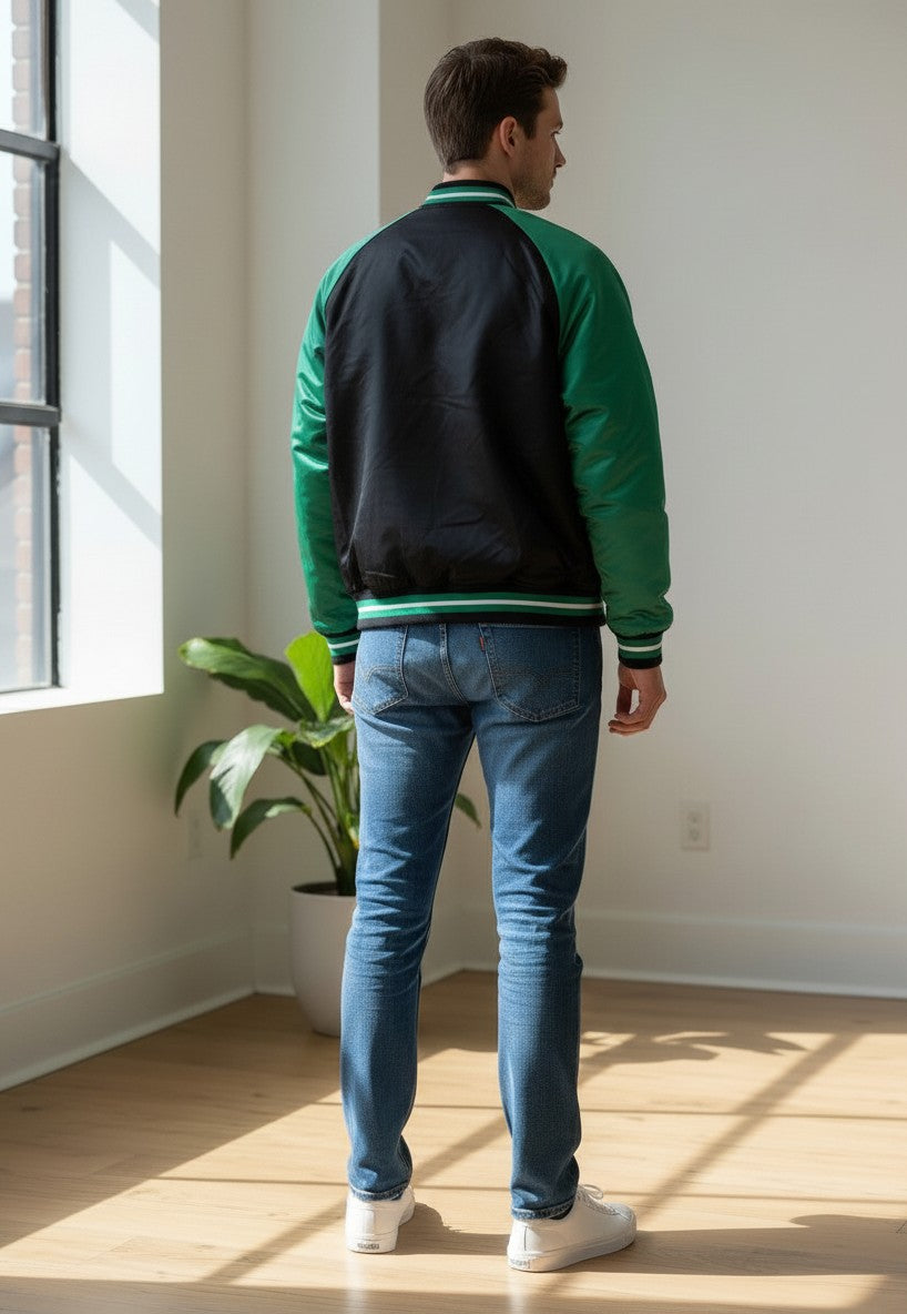 Throwback Rack Boston Celtics Mitchell & Ness heavyweight jacket in black and green, back view on a model.