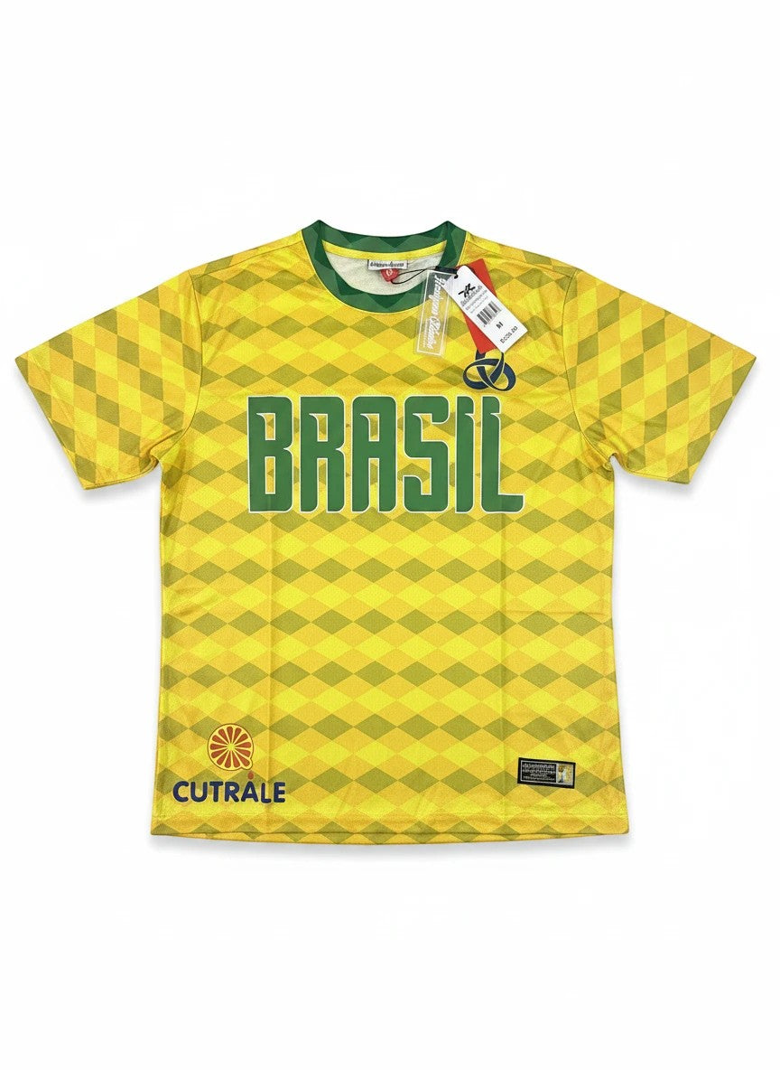Throwback Rack Brasil World Cup Soccer Jersey, yellow with green accents, diamond pattern, and "BRASIL" graphic.