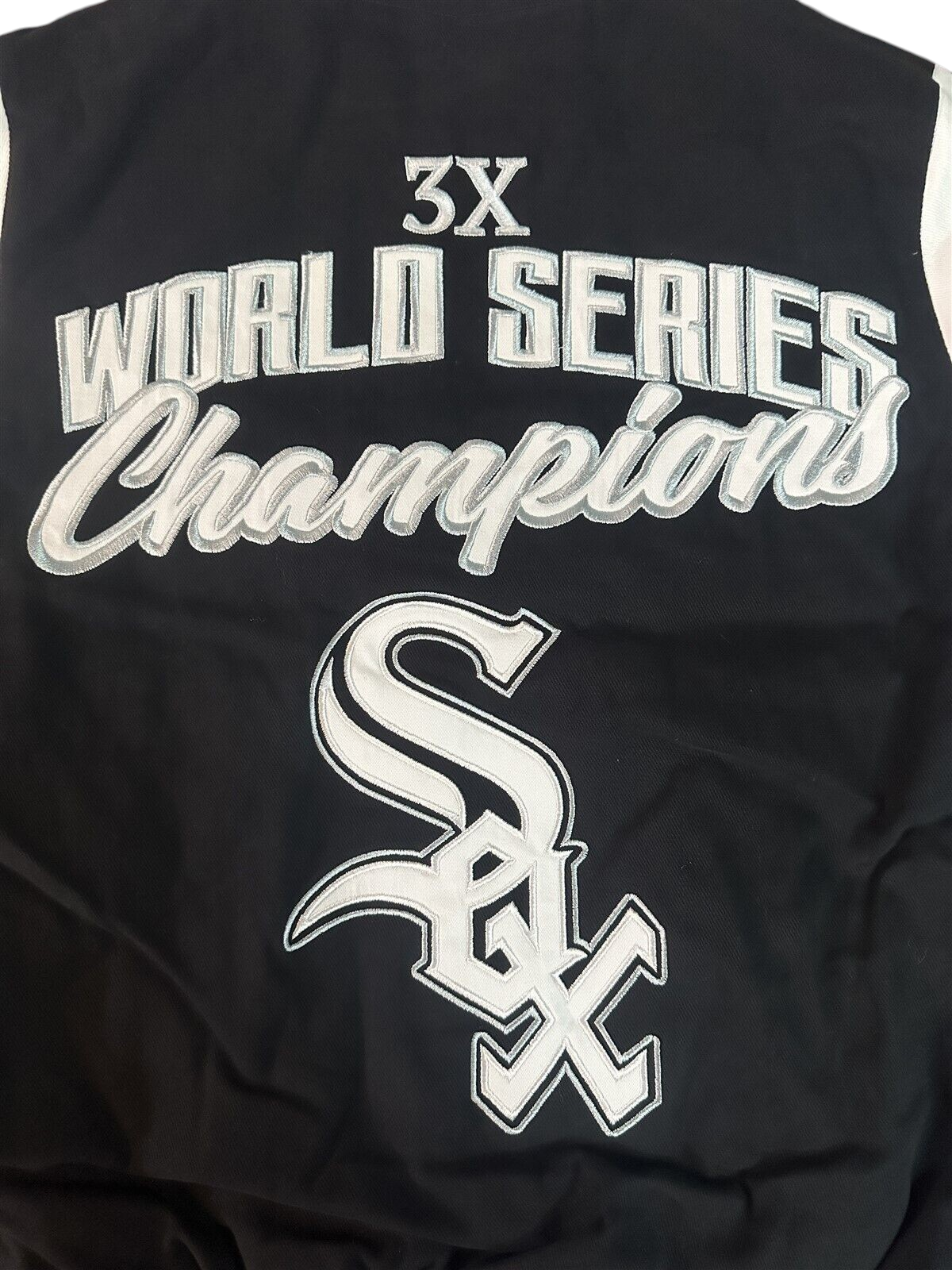 Throwback Rack Chicago White Sox 3X World Series Champions varsity jacket with black and white embroidered logo