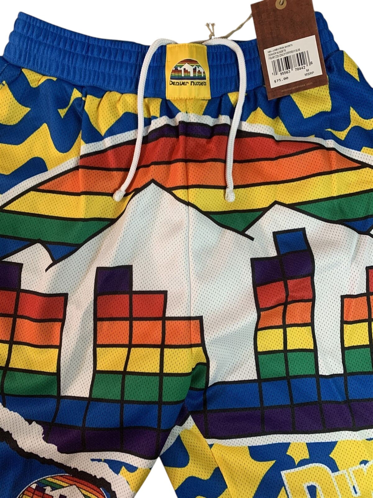 Throwback Rack Mitchell & Ness Denver Nuggets basketball shorts featuring a vibrant rainbow skyline mesh design.