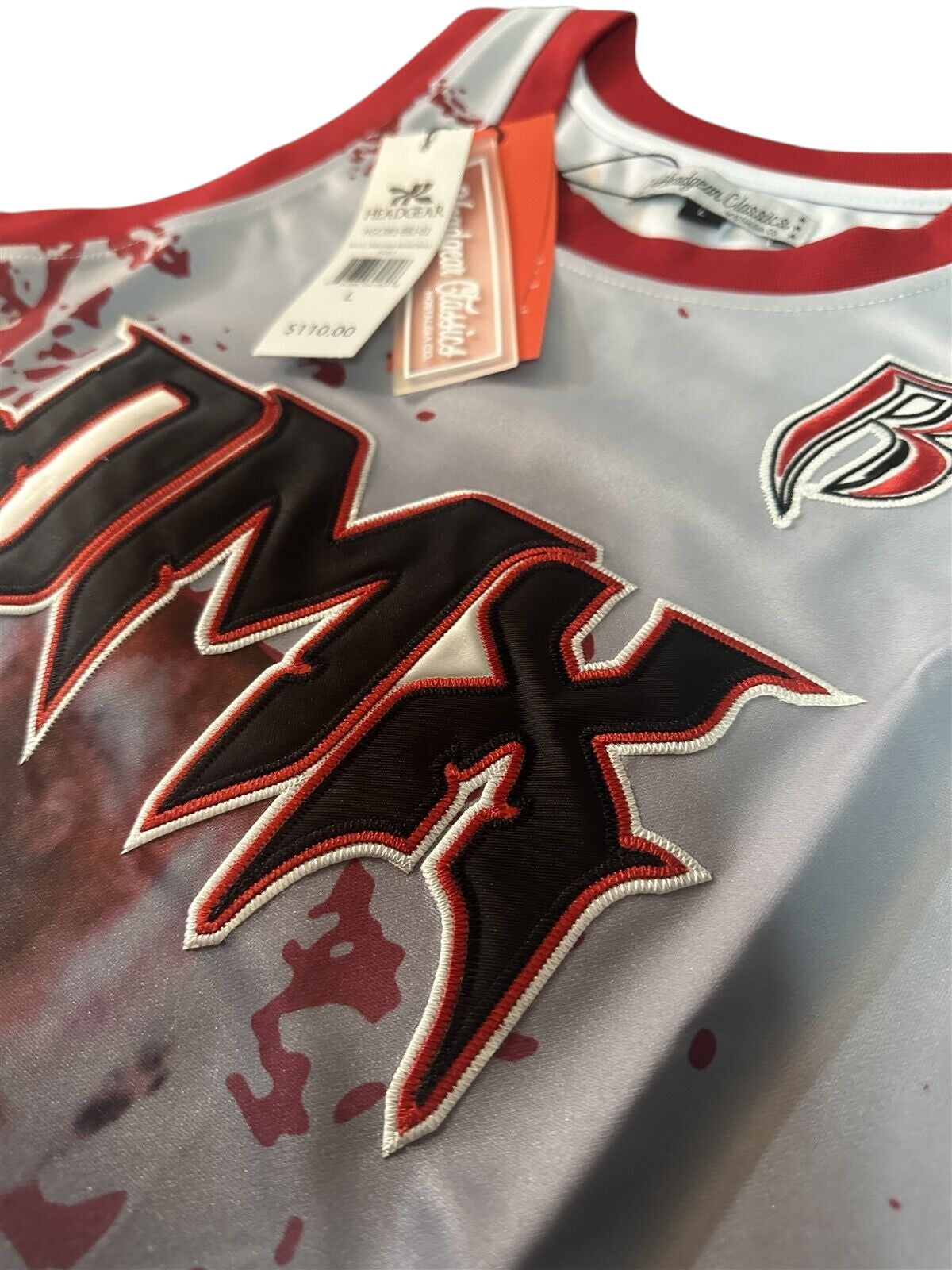 Throwback Rack DMX Praying Graphic Basketball Jersey with red splatter design and embroidered lettering.
