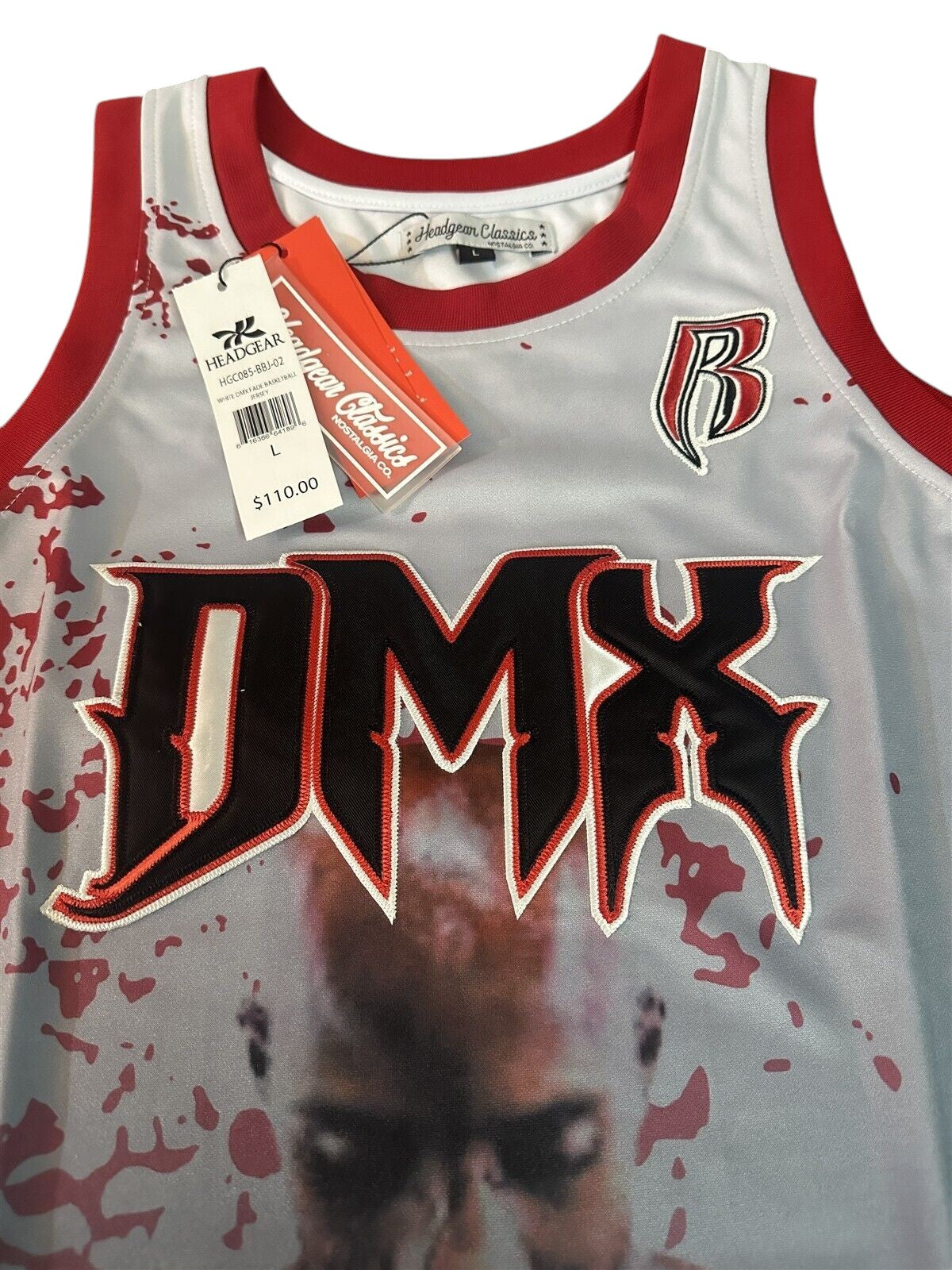 Throwback Rack DMX Praying graphic basketball jersey with red splatter design and DMX lettering. Light grey and black.