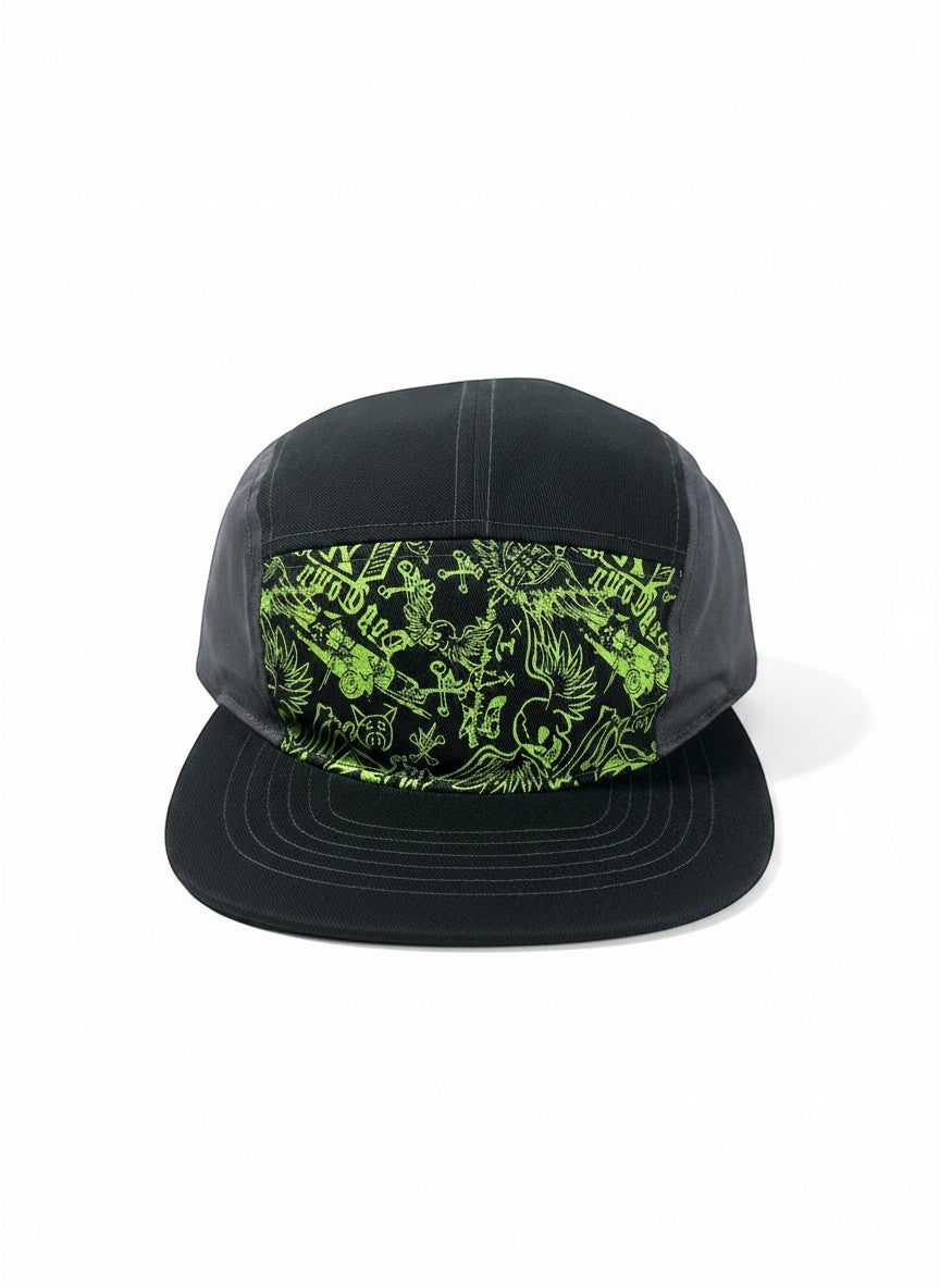 Throwback Rack Dog Town skater hat in black with a neon green graphic print featuring skulls, wings, and skateboards. Adjustable strap.