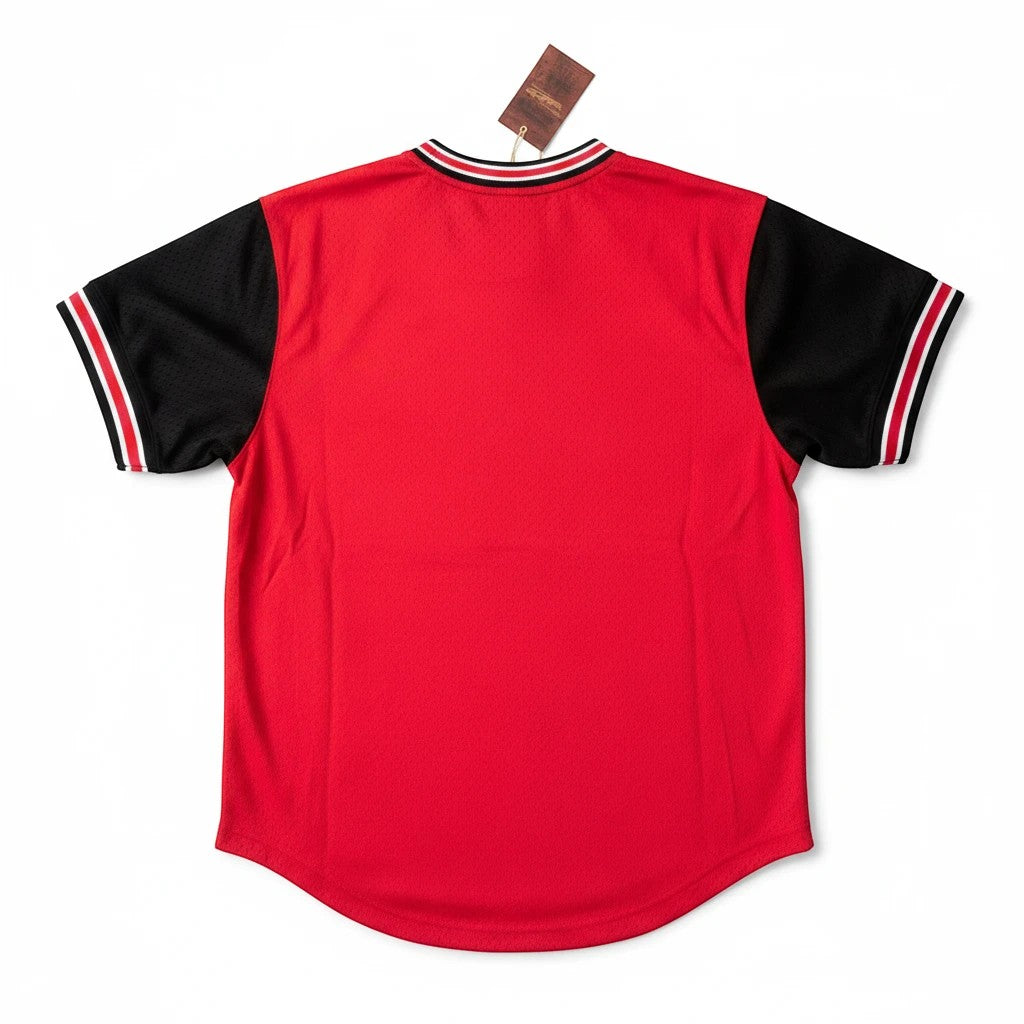 Throwback Rack Atlanta Falcons red football jersey with black sleeves and striped cuffs. Features V-neck and team logo detail.
