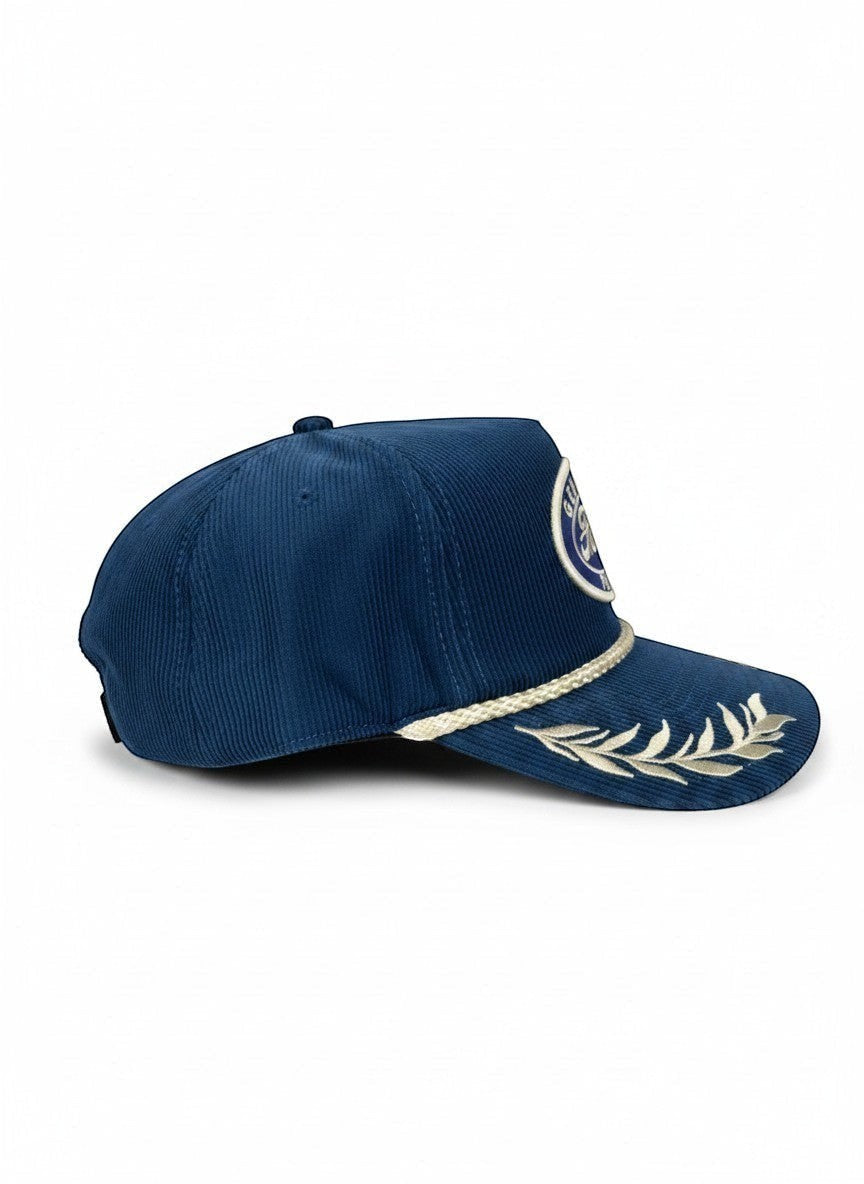 Throwback Rack navy blue corduroy Ford embroidered baseball cap with rope detail and leaf embroidery on brim.