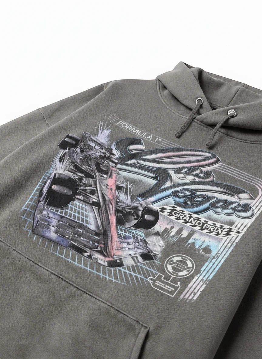 Throwback Rack Formula 1 Las Vegas Grand Prix graphic hoodie in charcoal grey, featuring a dynamic F1 car and cityscape.