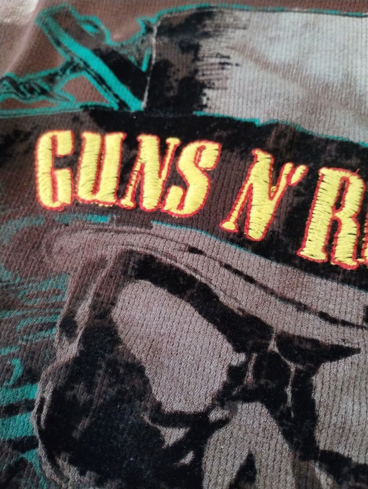 Throwback Rack Guns N' Roses brown thermal shirt with embroidered skull and top hat graphic in teal and yellow