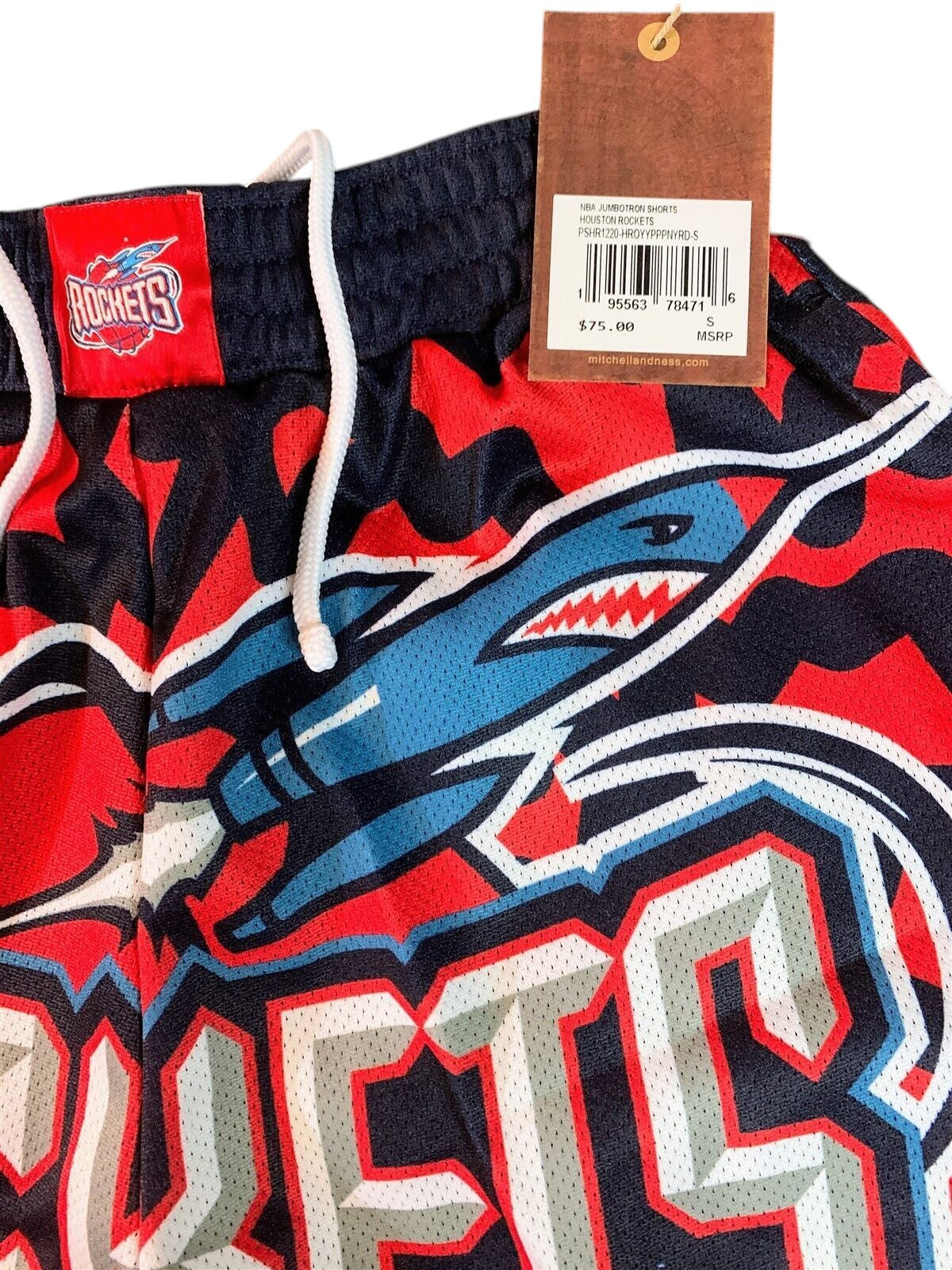 Throwback Rack Houston Rockets Mitchell & Ness basketball shorts in red and black mesh with rocket ship graphics.