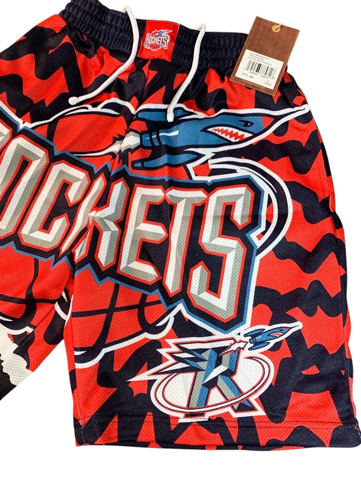Throwback Rack Houston Rockets Mitchell & Ness mesh basketball shorts in red and black with oversized rocket graphics.