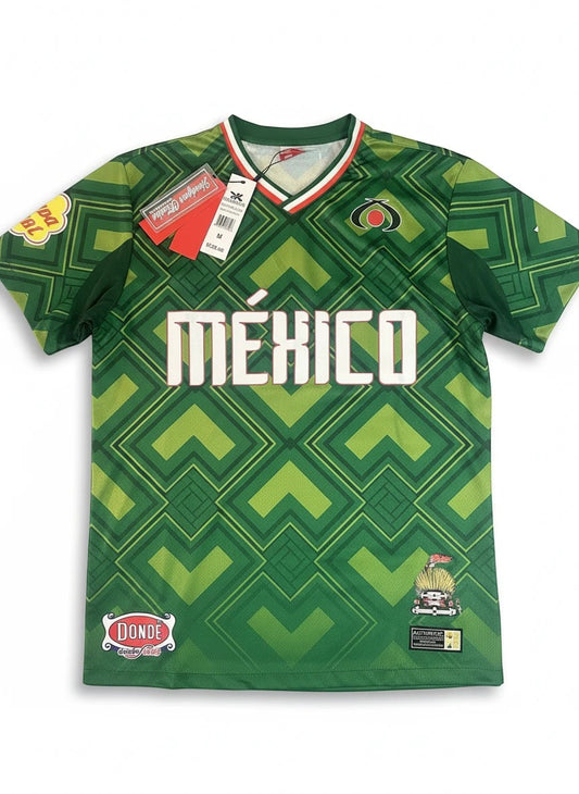 Throwback Rack green geometric pattern Mexico 1990 World Cup soccer jersey with white MEXICO lettering.