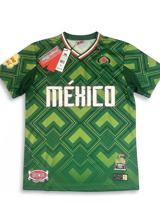 Throwback Rack green geometric pattern Mexico 1990 World Cup soccer jersey with white MEXICO lettering.