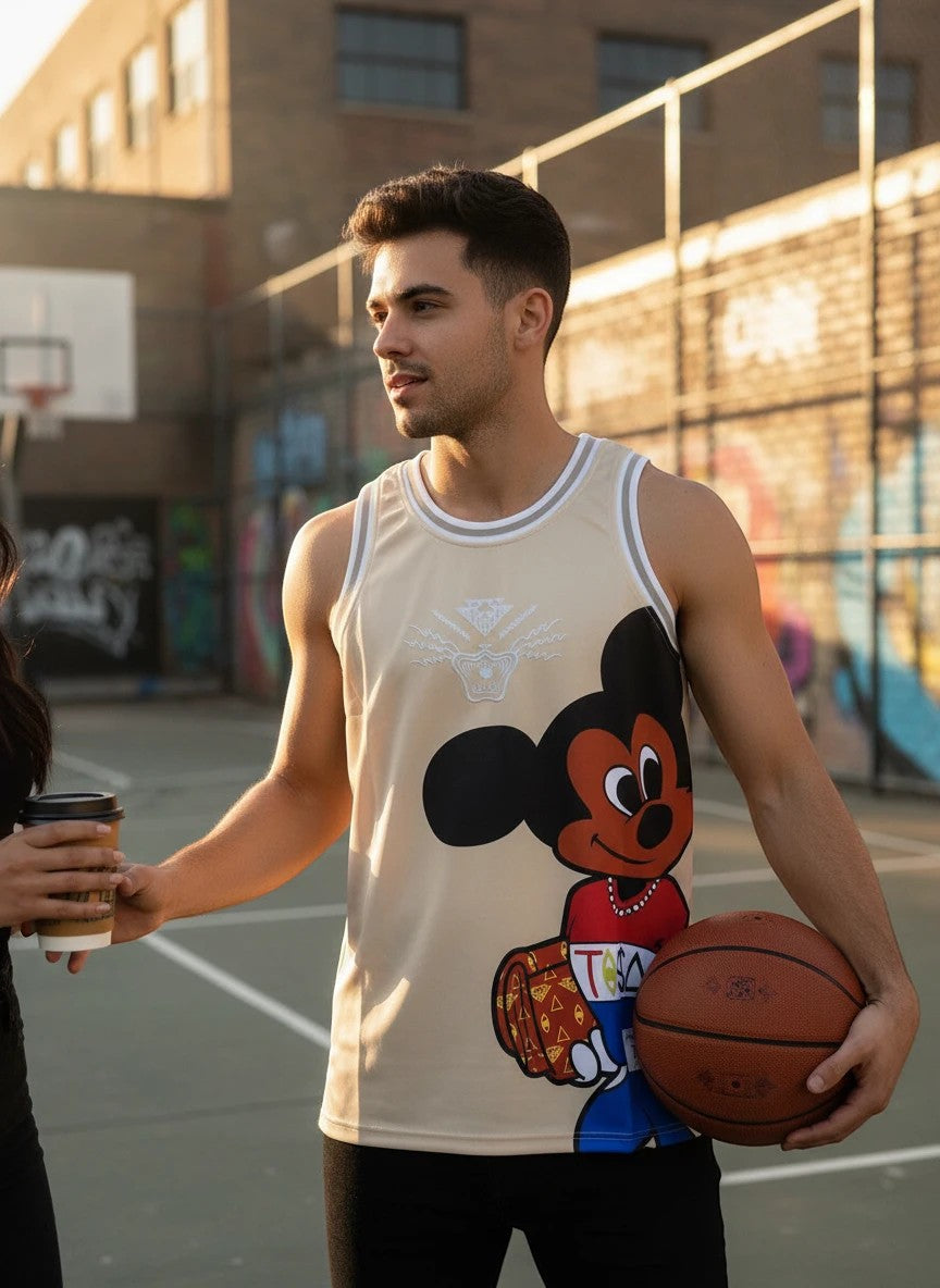 Throwback Rack tan basketball jersey with Mickey Mouse graphic, white and grey trim, and "T$Δ" emblem.