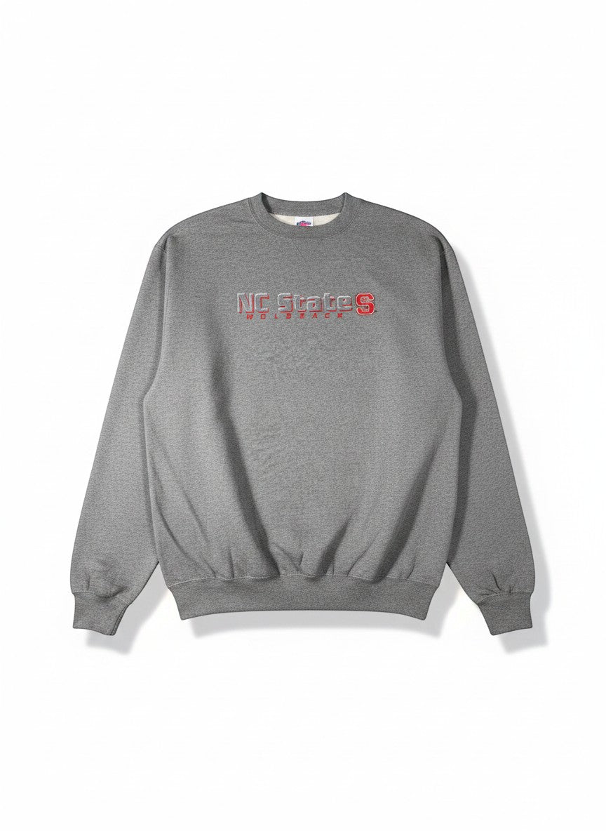 Throwback Rack grey crewneck sweatshirt with NC State Wolfpack logo embroidered in red and white.