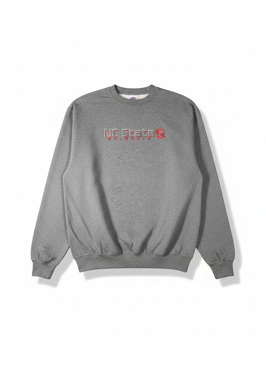 Throwback Rack grey crewneck sweatshirt with NC State Wolfpack logo embroidered in red and white.
