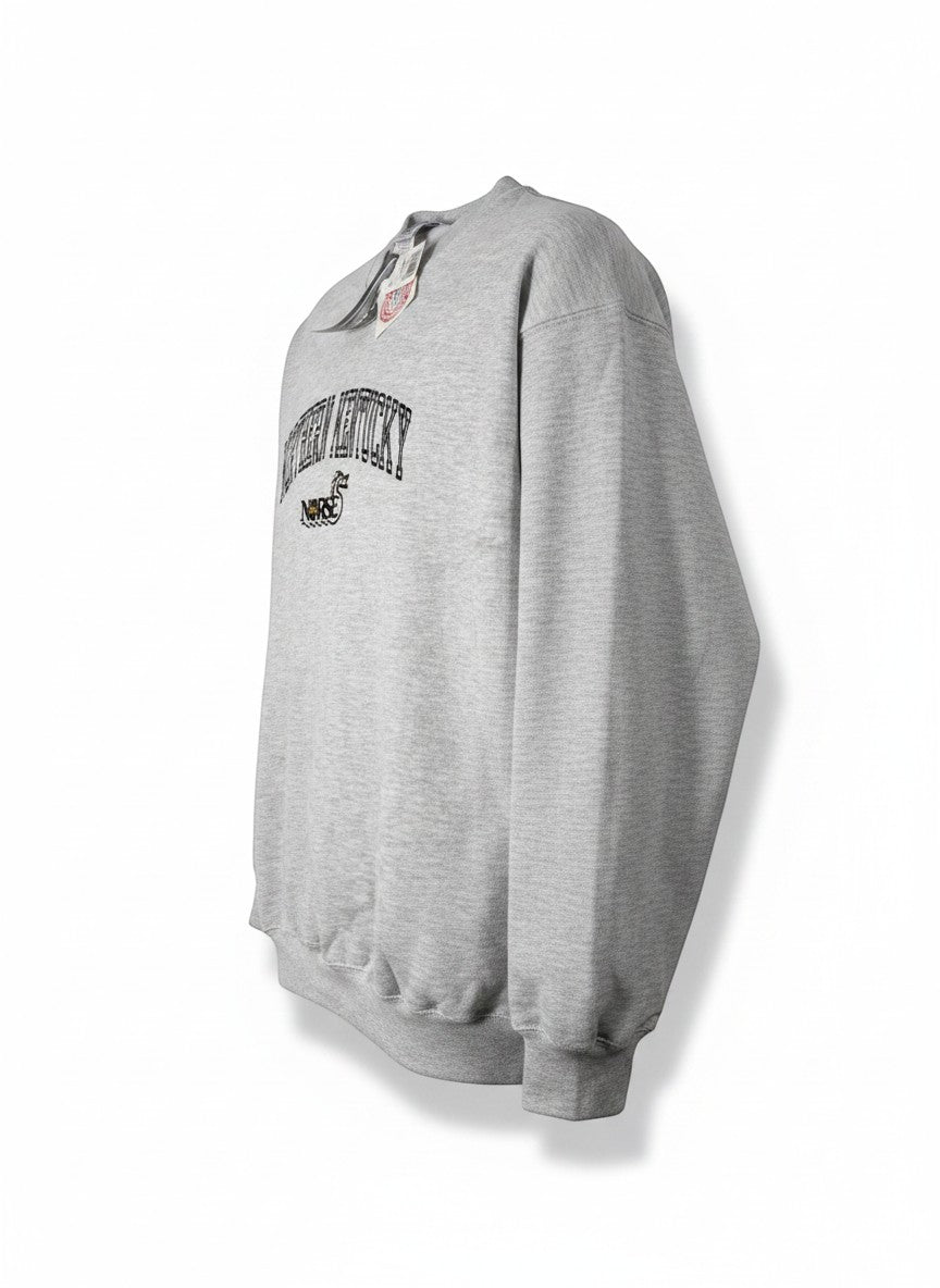 Throwback Rack grey heather cotton blend vintage Northern Kentucky University sweatshirt with black arched text and Norse logo.