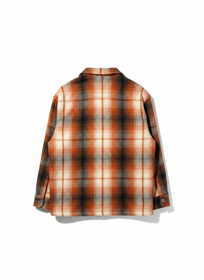 Throwback Rack Levi’s Plaid Wool Portola Jacket in orange, cream, and black plaid. Features a collared neckline and button cuffs.