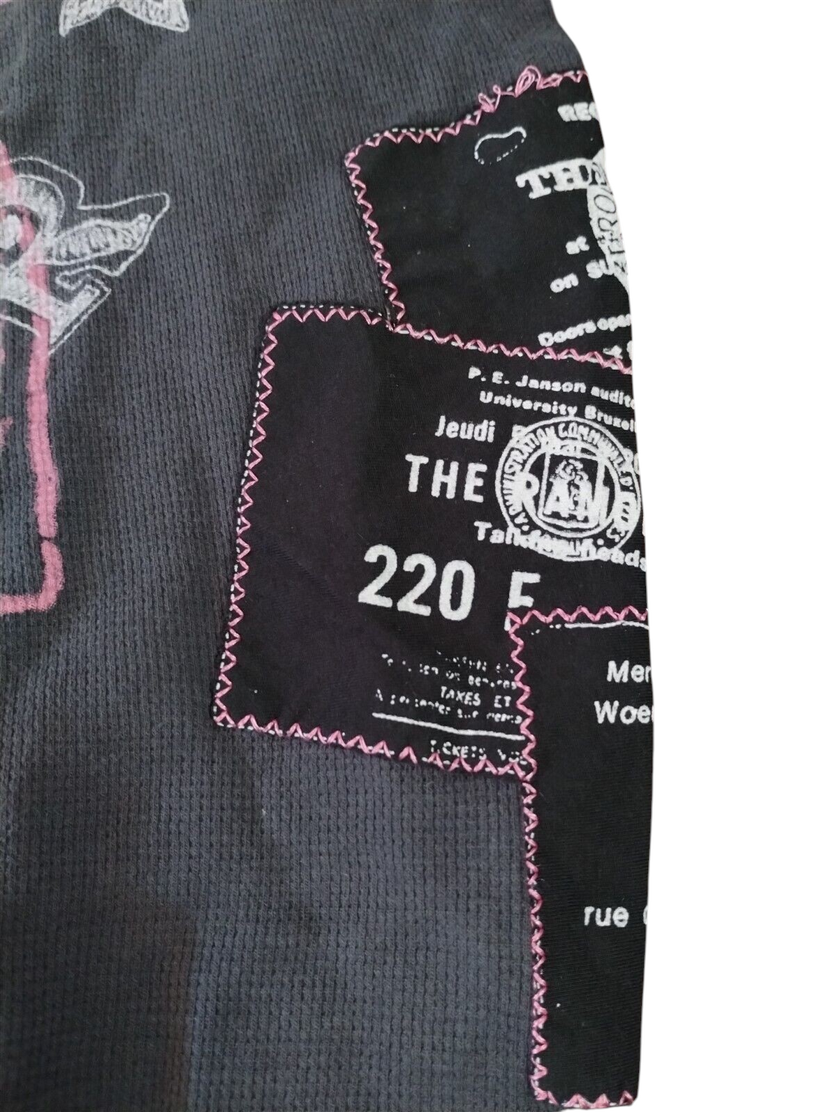Throwback Rack charcoal thermal shirt with black distressed patches, pink zig-zag stitching, and Ramones graphic print.