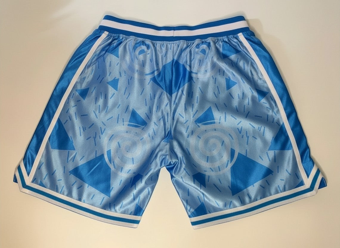 Throwback Rack blue Rugrats basketball shorts with a 90s-inspired geometric pattern and elastic waistband.