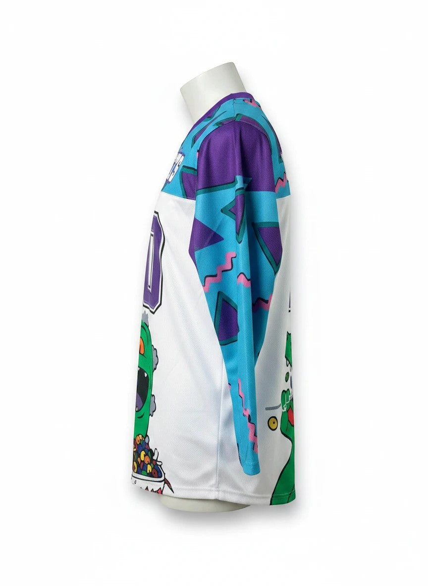 Throwback Rack Rugrats Reptar hockey jersey with purple and teal geometric pattern on sleeves and white body.