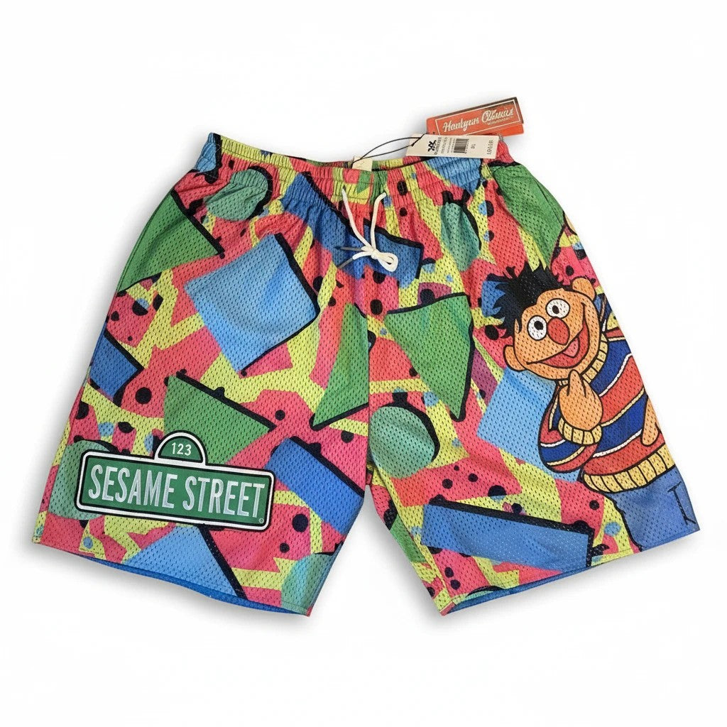 Throwback Rack Sesame Street basketball shorts featuring Ernie and a 123 Sesame Street sign on colorful mesh fabric.