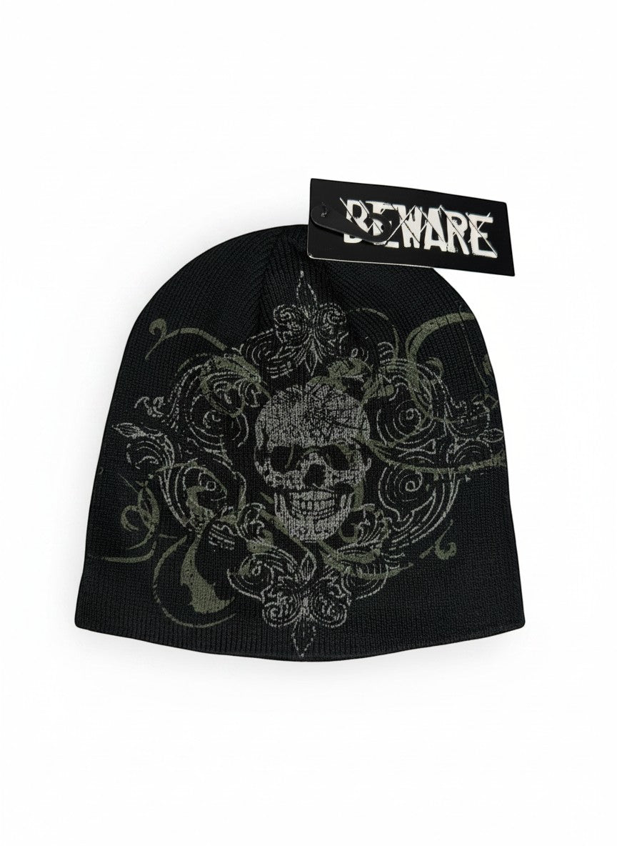 Throwback Rack black knit beanie with a distressed skull and floral graphic in green and grey. One size fits most.