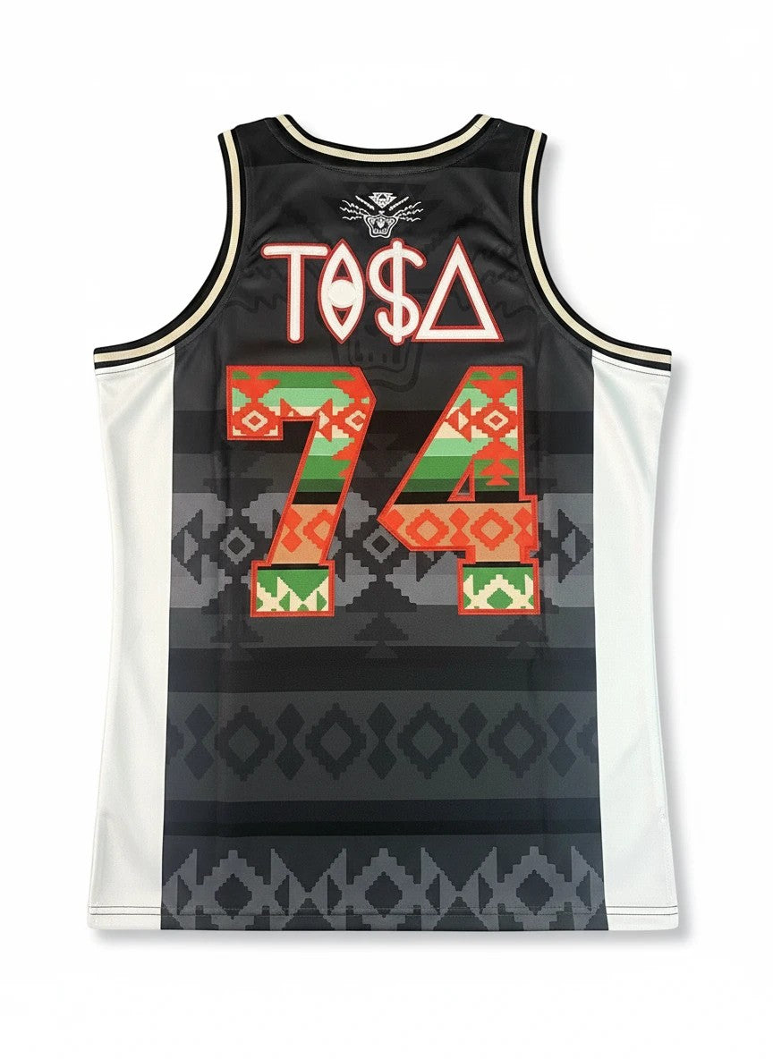 Throwback Rack Men's graphic print basketball jersey with geometric patterns in black, white, red, green, and orange. Features "TOSA 74" on back.
