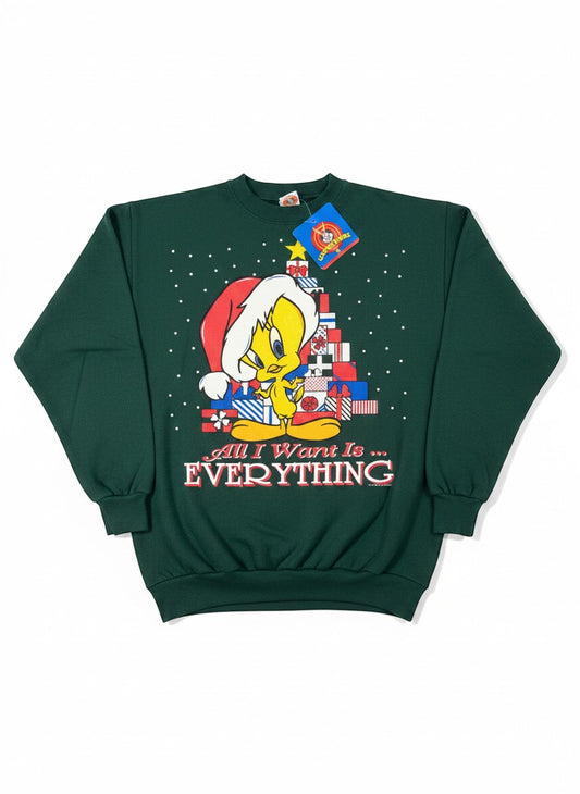 Throwback Rack green vintage Christmas sweatshirt with Tweety Bird wearing a Santa hat, surrounded by presents. Text reads "All I Want Is... EVERYTHING".