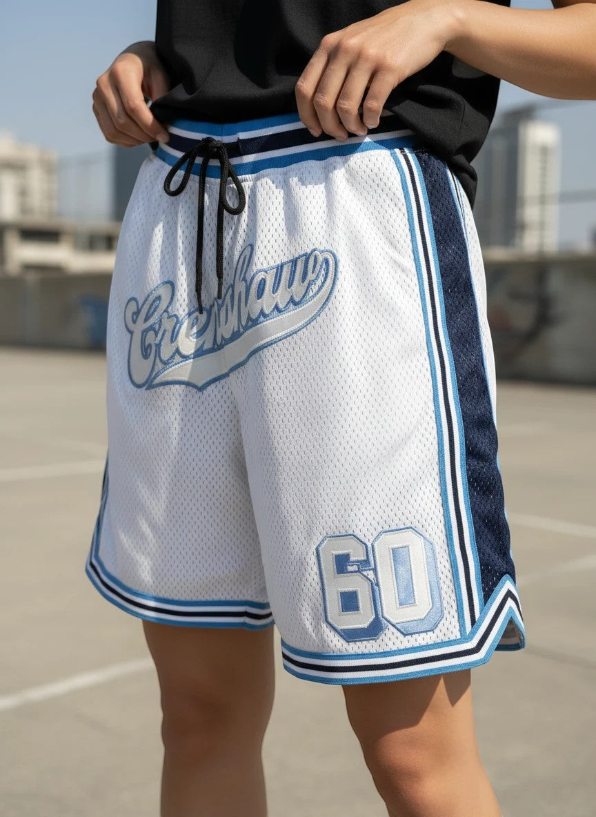 Throwback Rack white mesh basketball shorts with blue Crenshaw script and number 60 graphic, featuring an elastic waist.