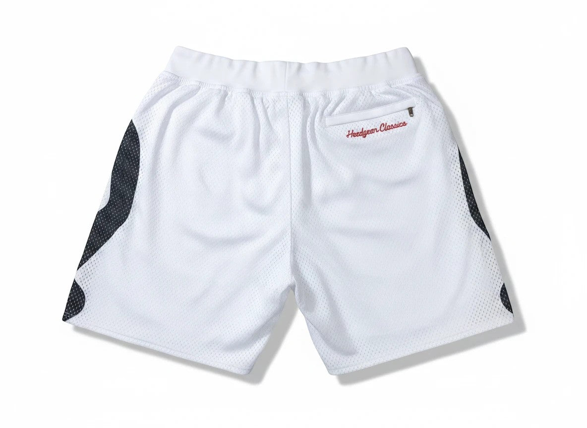 Throwback Rack white mesh basketball shorts with black side panels, elastic waistband, and rear zippered pocket.