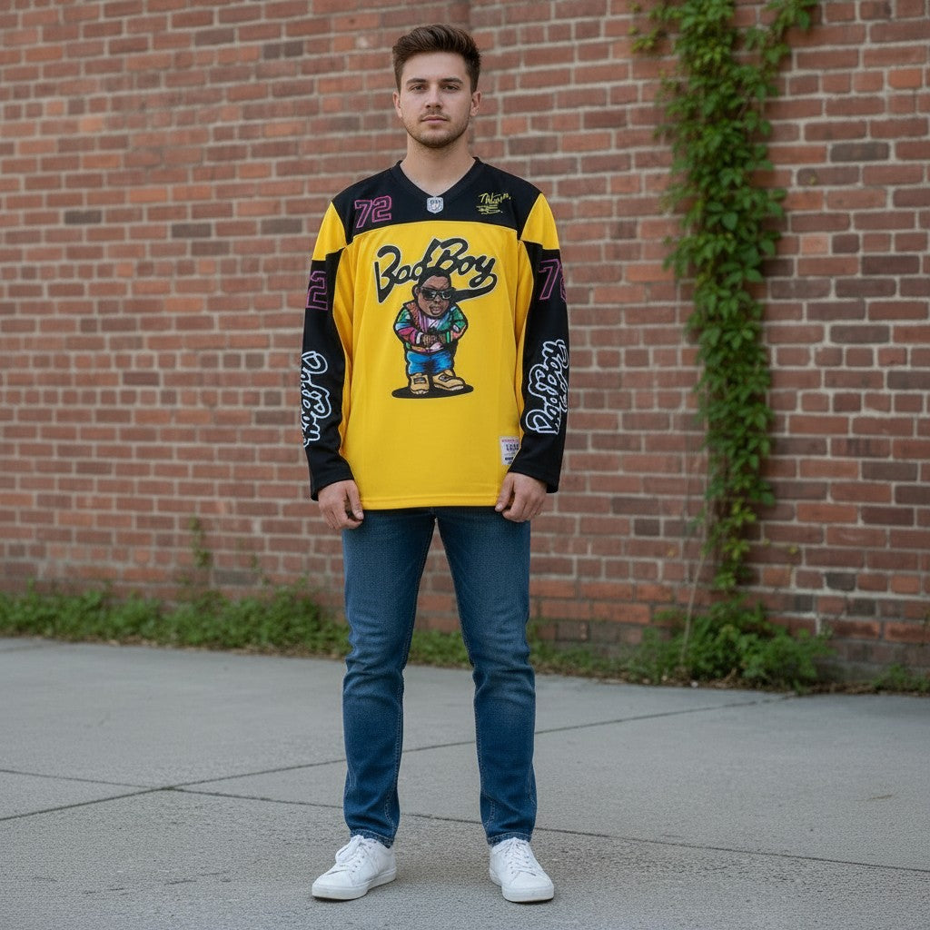Throwback Rack yellow polyester hockey jersey with black sleeves, featuring a cartoon graphic and "Bad Boy" text. Available in sizes M-XXL.