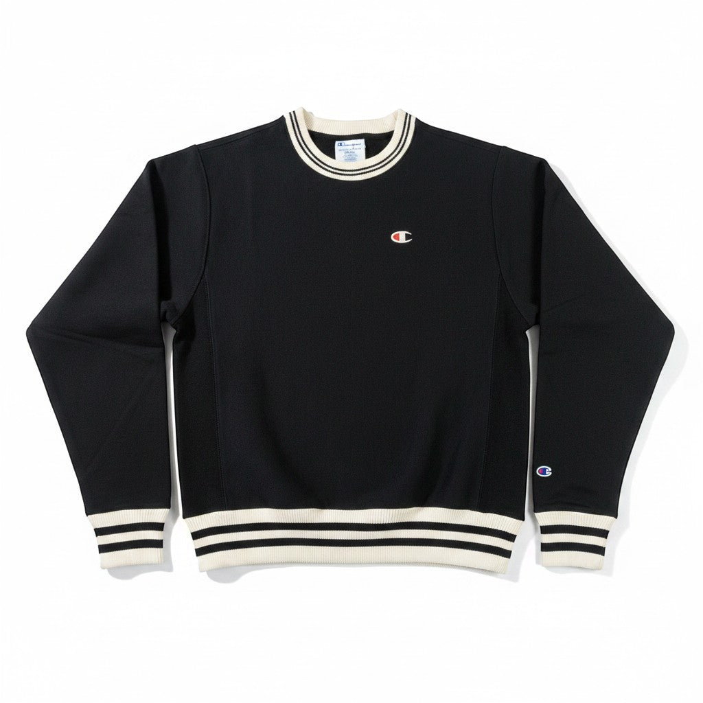 Throwback Rack black Champion Reverse Weave crew neck sweatshirt with cream striped cuffs and hem. Embroidered C logo on chest.