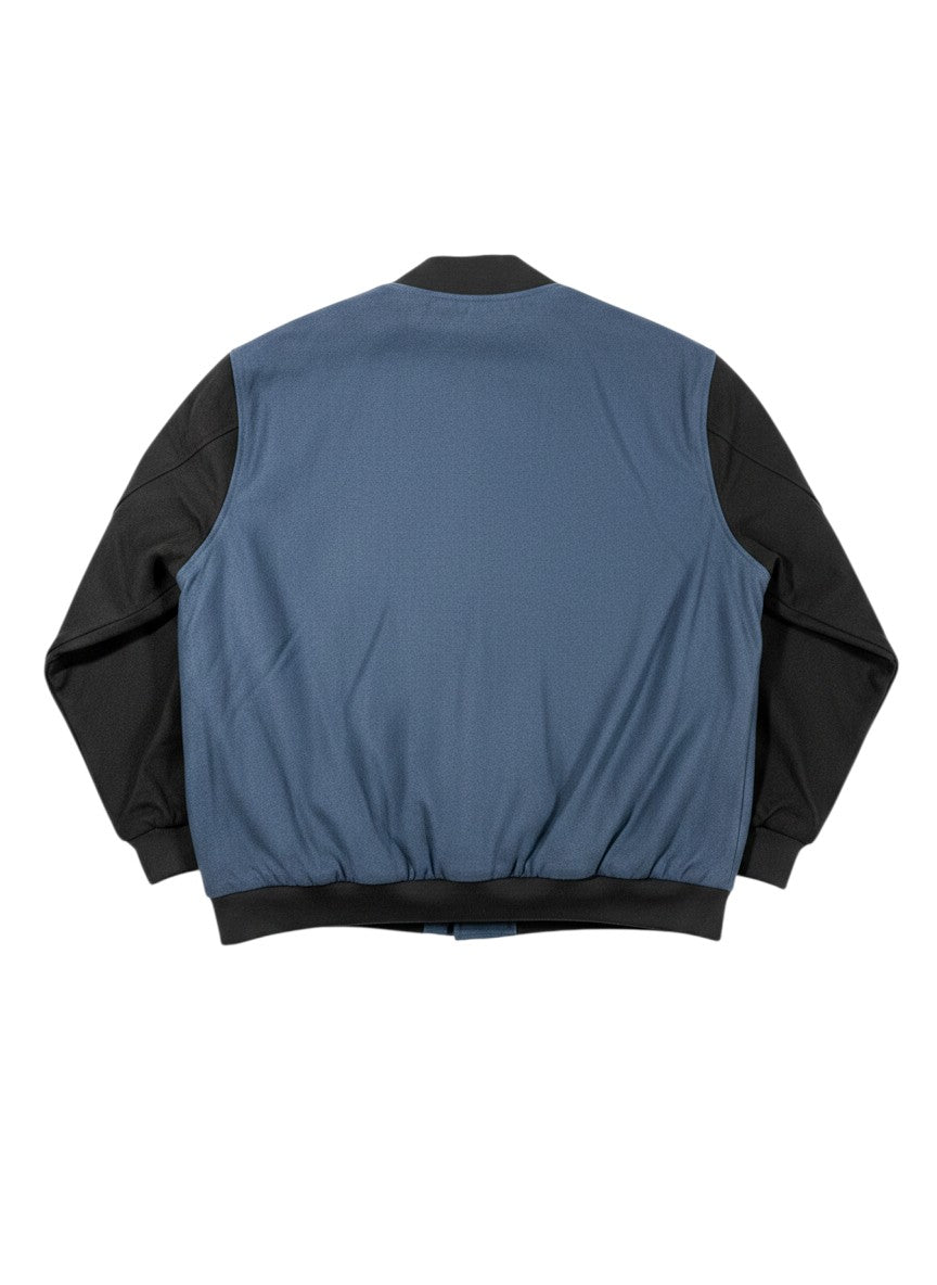 Throwback Rack Levi's blue and black varsity bomber jacket with ribbed cuffs and hem.