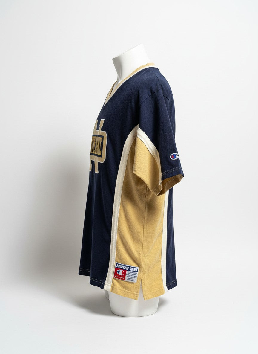 Throwback Rack navy blue and gold Notre Dame Champion t-shirt with v-neck and side panel detail.